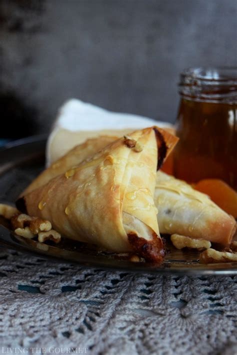 apricot-and-brie-phyllo-triangles-living-the-gourmet image