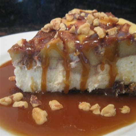 spiced-apple-cheesecake-with-rum-caramel-sauce image