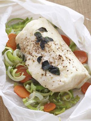 leeks-and-halibut-in-parchment-recipe-country-living image