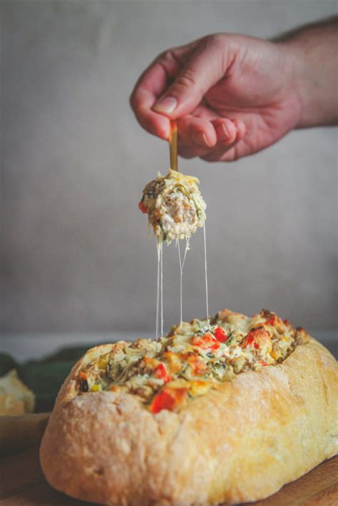 cheesy-sausage-dip-in-a-bread-boat-sweetphi image