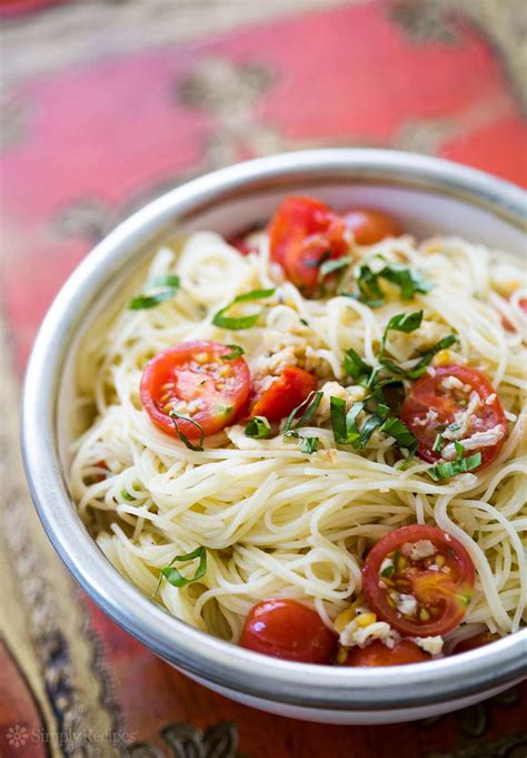 angel-hair-pasta-with-clams-cherry-tomatoes-and-basil image