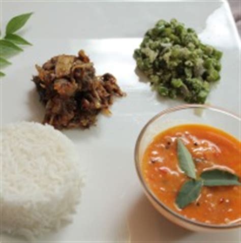 lamb-with-beans-thoran-potato-curry-and-rice image