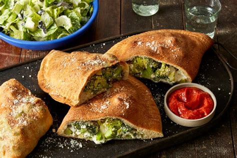 broccoli-mozzarella-calzones-with-caesar-salad image