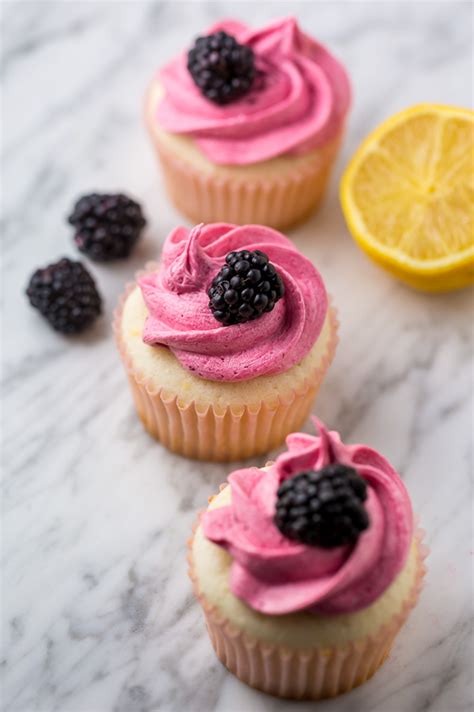 lemon-cupcakes-with-blackberry-buttercream-baker image