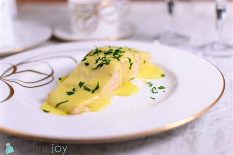 poached-salmon-with-creamy-hollandaise-sauce image
