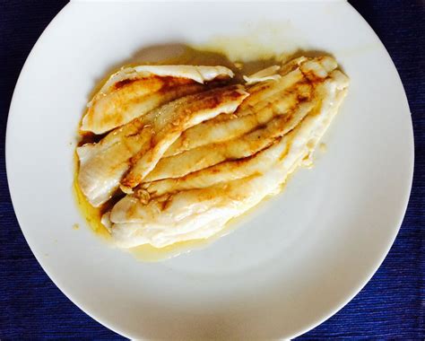 sole-en-papillotes-with-anchovy-brown-butter-sauce image