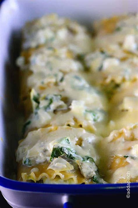 spinach-artichoke-lasagna-rolls-recipe-add-a-pinch image
