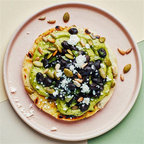 arepas-with-black-beans-and-avocado-recipe-bon-apptit image