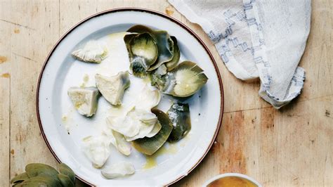 steamed-artichokes-with-garlic-butter-recipe-bon-apptit image