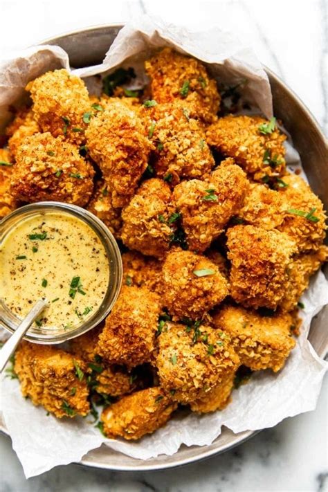 baked-chicken-nuggets-with-honey-mustard-dipping image