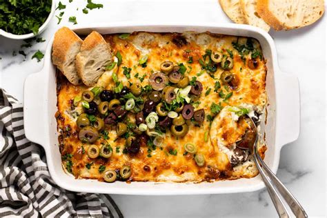 30-minute-cheesy-baked-olive-dip-midwest-foodie image