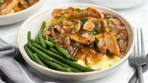 savory-boneless-pork-chops-and-mushroom-gravy image