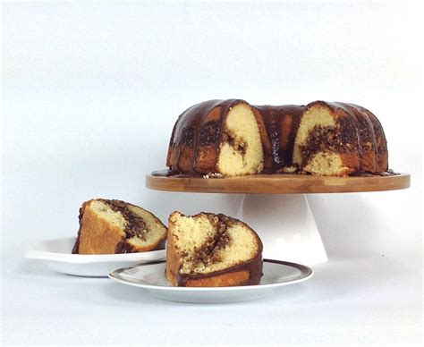 coffee-cake-with-nuts-and-chocolate-glaze-a image