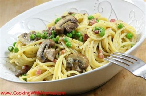 spaghetti-with-peas-prosciutto-and-mushrooms image