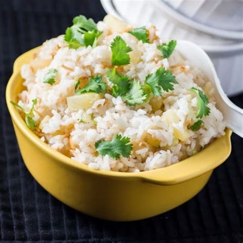 how-to-make-pineapple-coconut-rice-noshing-with-the image