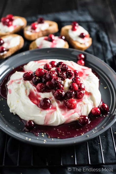 lemon-whipped-ricotta-with-cranberry-honey-the-endless-meal image