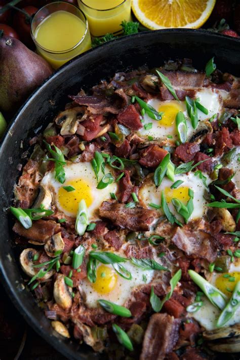 skillet-eggs-with-mushrooms-and-bacon image