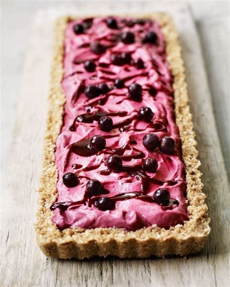 blackcurrant-lime-and-coconut-cheesecake-slice image