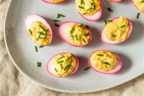 pickled-deviled-eggs-with-chives-the-wicked-noodle image