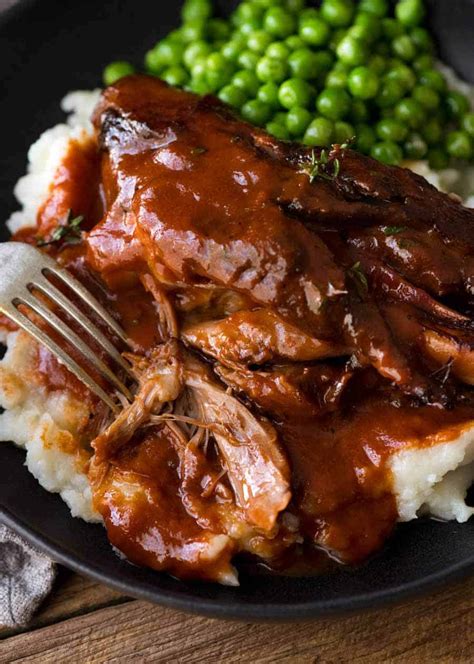 slow-cooked-lamb-shanks-in-red-wine-sauce-recipetin image