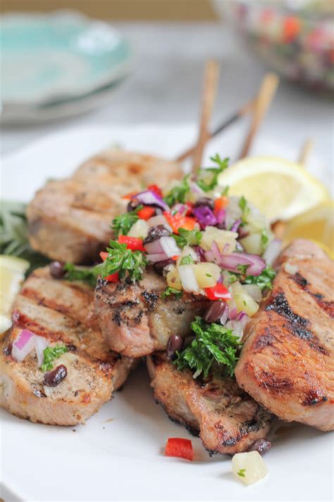 grilled-pork-chops-on-a-stick-with-pineapple-salsa image