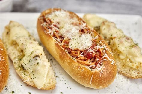 cheesy-garlic-bread-spaghetti-bread-boats-the-kitchen image