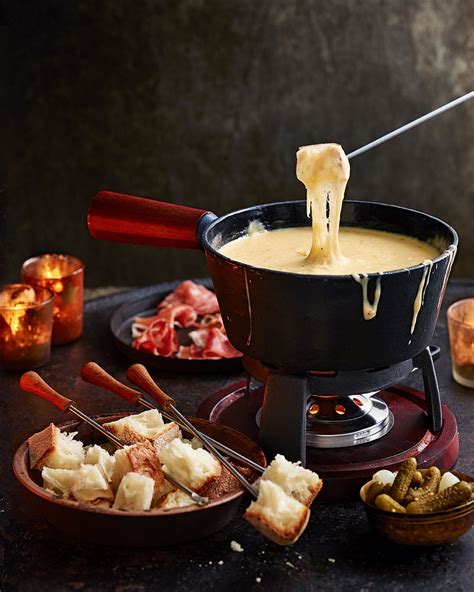 the-ultimate-swiss-cheese-fondue-recipe-delicious image