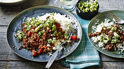 spicy-chilli-con-carne-with-guacamole-recipe-bbc-food image