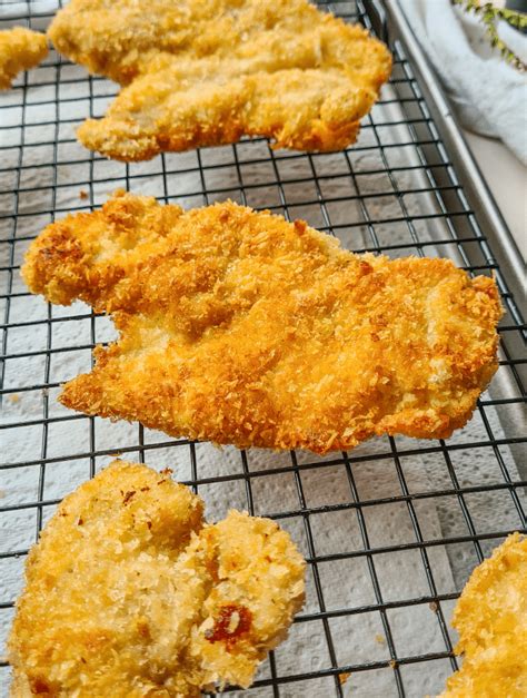 panko-chicken-schnitzel-crispy-and-juicy-casually-peckish image