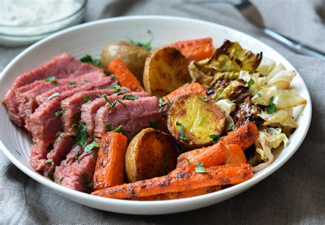roasted-corned-beef-and-cabbage-with-carrots-potatoes image