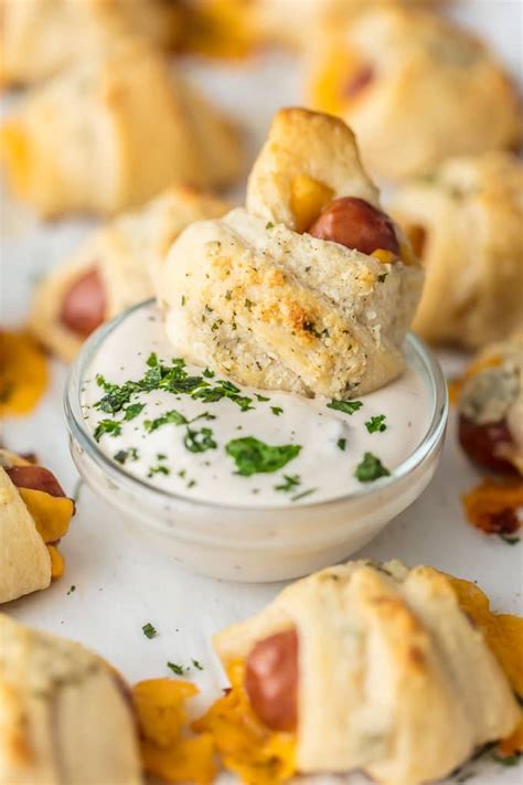 pigs-in-a-blanket-with-cheese-and-parmesan-ranch-butter image