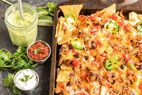 sheet-pan-chicken-nachos-easy-dinner-or-party-appetizer image
