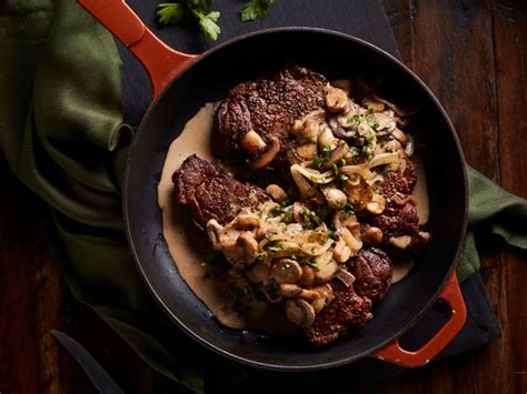 seared-steak-with-whiskey-cream-sauce-hy-vee image