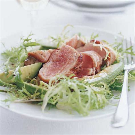 bacon-wrapped-tuna-steaks-with-frise-and-avocado image