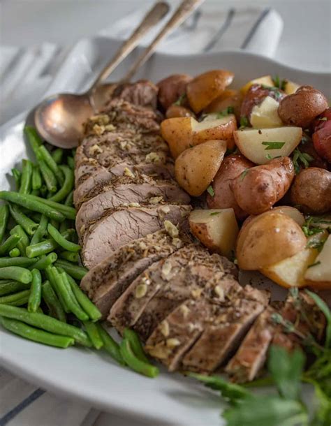 the-best-slow-cooker-pork-tenderloin-and-potatoes image
