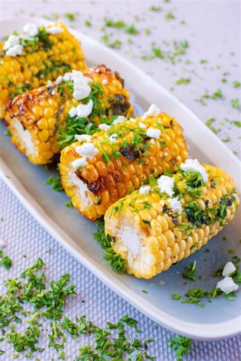 grilled-corn-with-herb-butter-hungry-healthy-happy image