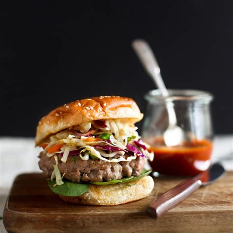 ginger-sesame-pork-burgers-with-slaw-food-wine image