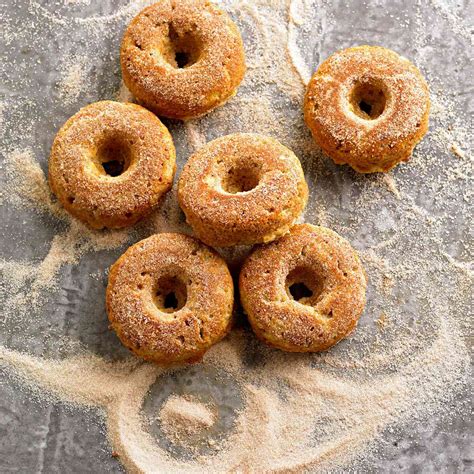baked-apple-spice-donuts-better-homes-gardens image