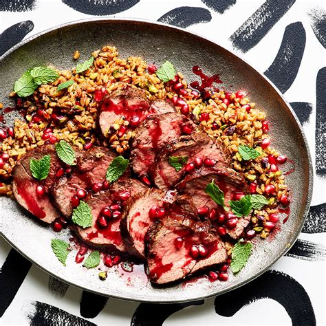 beef-tenderloin-with-pomegranate-sauce-farro-pilaf image