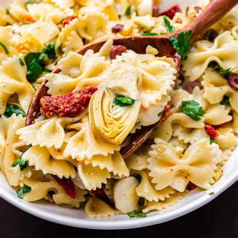 pasta-salad-with-sun-dried-tomatoes-and-artichoke-hearts image
