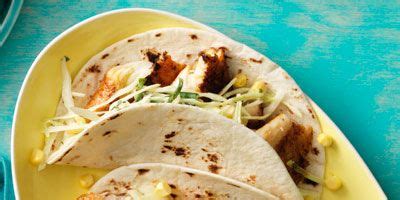 spicy-fish-tacos-with-creamy-cabbage-and-corn-slaw image