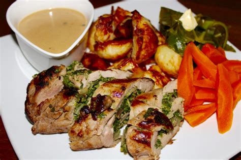 roasted-pork-tenderloin-with-brandy-and-peppercorn-sauce image