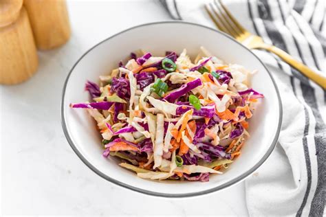 coleslaw-salad-recipe-with-purple-cabbage-the-spruce image