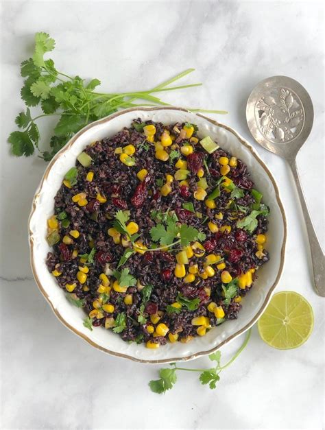 festive-black-rice-pilaf-with-corn-and-cranberries image