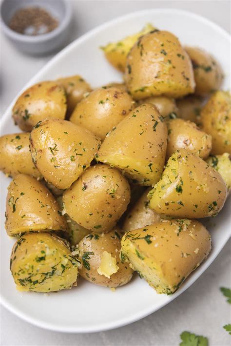 buttery-boiled-potatoes-recipe-with-fresh-herbs-the image