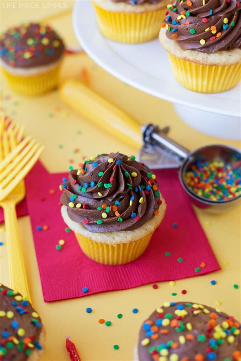 classic-yellow-cupcakes-with-chocolate-frosting-life image