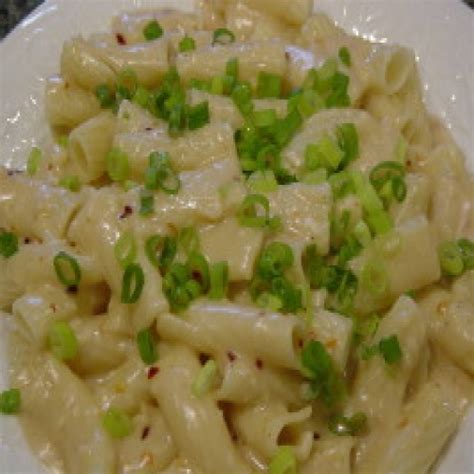 garlic-parmesan-cream-sauce-over-pasta-complete image