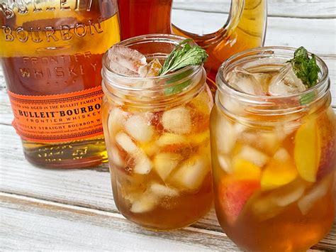 mixed-whiskey-peach-punch-cocktail-large-batch image