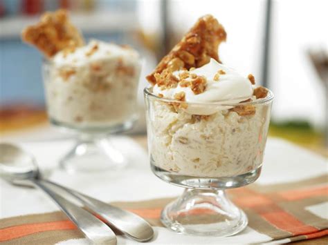 rum-raisin-rice-pudding-with-malted-whip-and-hazelnut image