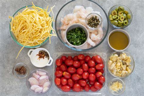 sheet-pan-shrimp-puttanesca-recipe-the-spruce-eats image